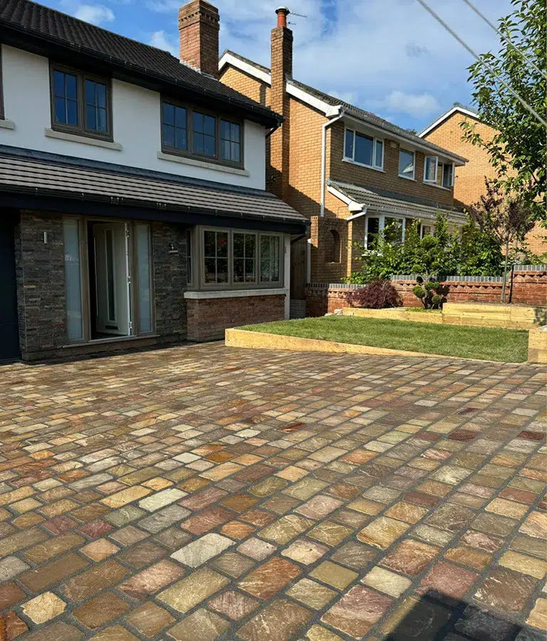 CSG Plastics & Build | Landscaping new Modern brick house with paved driveway and garden